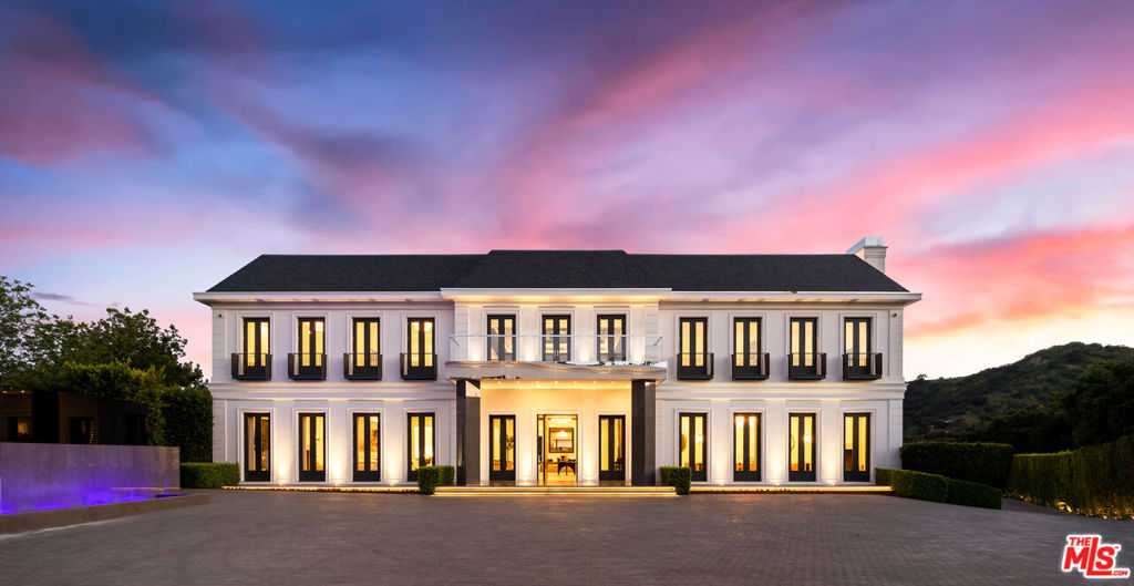 One of the most private and secured estates in Beverly Hills 90210. Overlooking magnificent mountain views, the newly rebuilt and expanded Wallingford estate is spread over a 5-acre exclusive promontory. A one-of-a-kind indoor sports complex with basketball, pickleball, gym, boxing ring, sports lounge and bar all celebrate an active lifestyle and the love of sports. Located just 8 minutes from the BH Hotel and 20 minutes from Van Nuys private airport, both entrances can only be accessed through private/gated streets. Exquisitely designed and built with impeccable taste, the sophisticated and stylish estate infuses today's technology with refined rooms. Totaling approx. 46K SF under roof and approx. 38K SF under A/C and boosting 12 bedrooms and 24 baths, approx. 5K SF guest penthouse, caretaker house, 2-bdrm guardhouse, 12 car garage and parking for 80. Stunning zero edge pool perfectly frames the extensive grounds & views. Additional properties on the private street are also available.