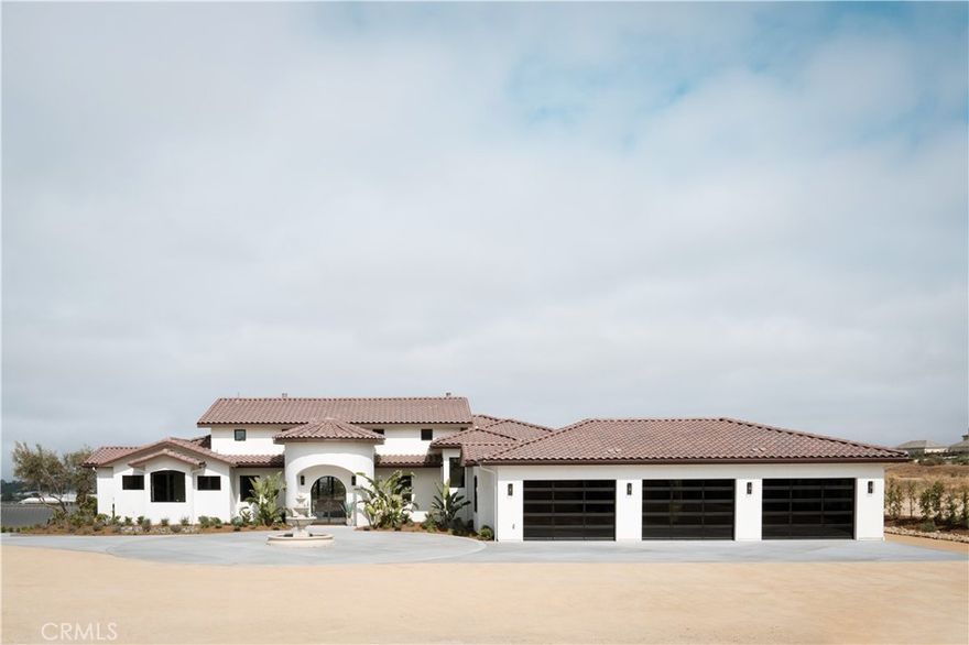 Discover unparalleled modern Spanish luxury at 467 Del Sur, Arroyo Grande. This brand-new, exquisite 4-bedroom, 3-bath masterpiece with a powder room, built by Innovation Design and Development redefines sophisticated Central Coast living.

Step inside an expansive open-concept living space, bathed in natural light, offering stunning ocean views.

 The seamless flow between the gourmet kitchen, dining, and living areas is perfect for entertaining. The chef's dream kitchen features top-of-the-line appliances, custom cabinetry, a generous island, and a spacious butler's pantry for discreet prep and storage.

Beyond, find a dedicated wine room—a stylish space for connoisseurs. Each of the four well-appointed bedrooms offers a private sanctuary, while three luxurious bathrooms provide spa-like retreats. The primary bath elevates luxury with stunning Taj Mahal slabs.

The modern Spanish architecture shines through clean lines and elegant finishes. This home also boasts a spacious 3-car garage with durable epoxy flooring.

Located in desirable Arroyo Grande, 467 Del Sur offers tranquility and accessibility—close to amenities, wineries, and natural beauty. This is a rare opportunity to own a newly constructed home where luxury and design converge for an unparalleled living experience. Don't miss your chance to call this exceptional property home.