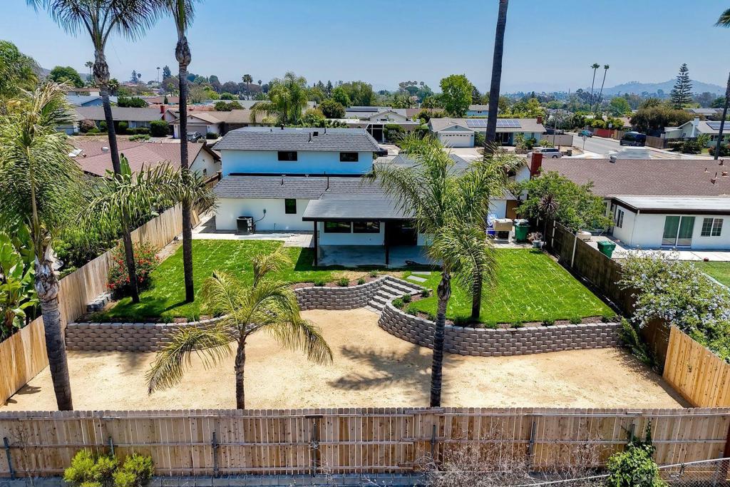 Lives like a single level home with the primary bedroom located on the first floor. New windows, new roof, new stucco, new hvac, new hot and cold water lines, fully renovated bathrooms including updated plumbing valves, fully renovated kitchen including appliances, new interior doors including doorknobs and hardware, new covered patio, new key stone retaining wall, and much more. Recently updated from top to bottom, this stunning residence features an open-concept living area, perfect for entertaining and everyday living. The sleek, upgraded kitchen boasts high-end finishes, custom cabinetry, and top-of-the-line appliances, seamlessly flowing into the generous living and dining spaces, creating a warm and inviting atmosphere. Situated in the highly sought-after Del Cerro neighborhood. Location is everything as You'll be just a short walk away from Lake Murray Park, Lake Murray, and the Mission Trails Golf Course. Families will appreciate the proximity to top-rated schools, including Patrick Henry High School and nearby elementary schools.