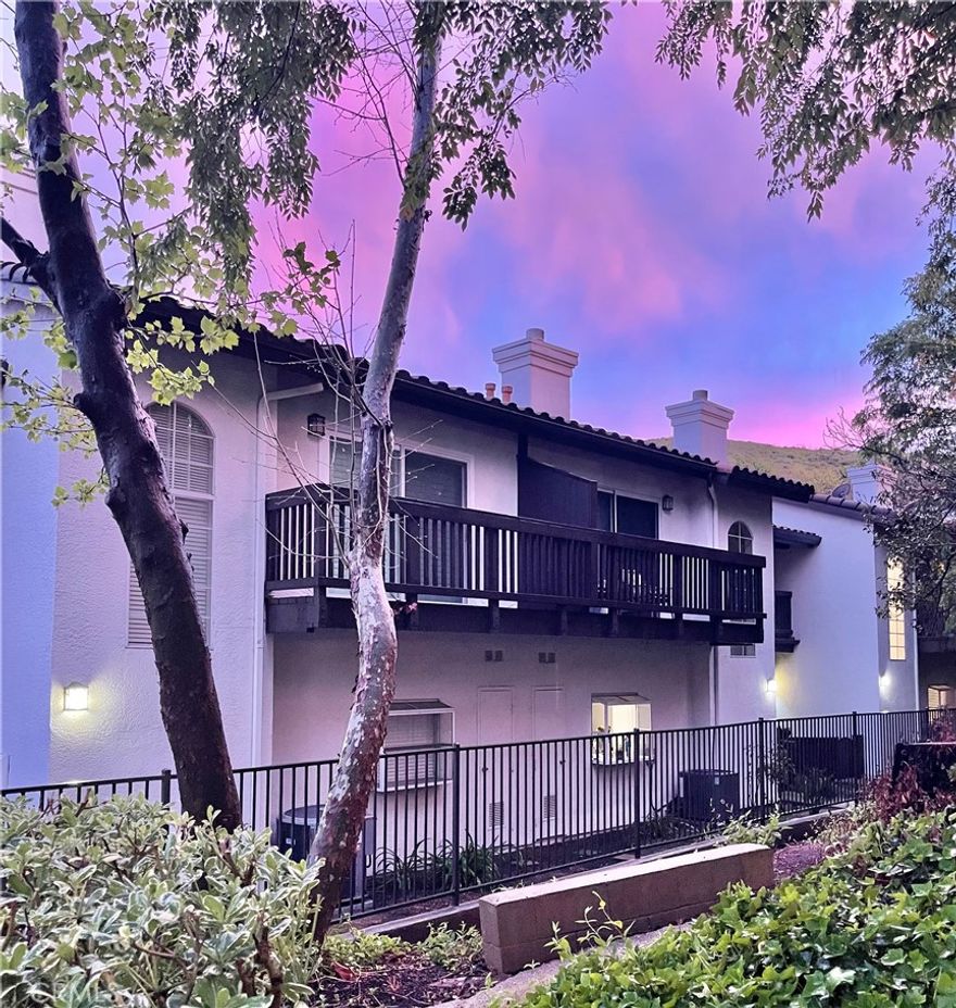 Stunning two story townhouse in a serene garden setting.No expense was spared with modern upgrades throughout. Imagine having breakfast in the kitchen while peering out a beautiful bay window overlooking a wooded hillside. Wonderful Oak Park Community schools. Take your dog for a stroll in the dog park and jump into the community pool. Available for lease just in time for the summer.  Walls are painted soft warm contrasting colors that compliment the vinyl planked floors. Kitchen &  laundry room remodeled with white shaker style cabinets & granite counters. All appliances replaced with stainless steel, washer dryer is a stackable LG,  french door style fridge with filtered water & a center drawer that can be used as part of fridge or freezer. Kitchen sink is amazing with its extra deep design. There is an island with pendulum lighting. The cabinets with glass doors have lighting to showcase favorite things. Two pantries for lots of storage.  Laundry room has counter space with an outlet perfect for a coffee maker, espresso machine or printer. Gas fireplace was redone with elegant brown marble & glass stones. All lighting was replaced with a combination of energy efficient recessed lights throughout as well as unique light fixtures. Dramatic globe shaped light fixture was added to the stairwell which illuminates the area in a nice warm glow. Even the front porch light was replaced with a beautiful lantern style design.Both master bedrooms have upgraded ceiling fans with lighting that can be operated by a switch or remote. Each master bedroom has a private balcony that faces the hillside.Both master bathrooms have skylights over the vanity for natural lighting. Each master bedroom has a walk in closet with built in shelves for added storage. Bathrooms are remodeled to look individually unique with a contemporary flair to include new light fixtures, vanities, mirrors, medicine cabinets, towel racks & towel hooks, shower doors, all the shower tub fixtures are replaces with water efficient styles. In 2022, upgraded  a/c & heater & water heater with energy efficient models operated by a Nest thermostat. Garage has recessed lights and a keyless entry pad. Townhouse comes with 2 parking spaces, one is in a single car deep detached garage & a covered carport that is located close to the entry.  Ample guest parking. Submit on pets. Walking distance to several awarding winning schools, parks, community center, dog park, shopping centers, library.
