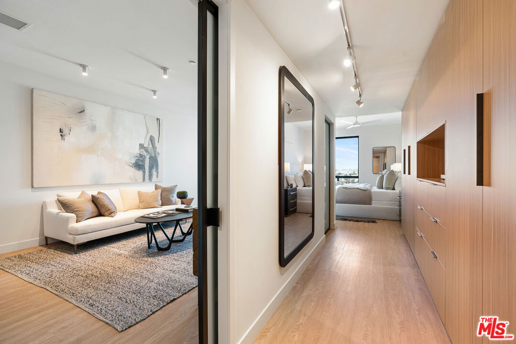 Venue Residences by Helio. This beautiful 1 bed + 1 bath is the A-layout available on the 4th floor, West facing. Kitchen has unique dark finishes with stained granite counters, matte black fixtures, and stainless steel Beko appliances. The open living and dining concept allow for a good flow of the space, as well as access to a large balcony for comfortable outdoor lounging. The bedroom has a large window, built in lighting and a remote controlled ceiling fan. From here you walk into the highlight of this layout which is the walk-through dressing room with beautifully custom made closets, a large built-in mirror, and adjustable lighting. The bathroom has ample counter space, a wall-to-wall mirror, standing shower with a rain shower head, separate bathtub, and a linen closet. Property amenities include: Fitness center, 2 rooftop lounges with heated dipping pool, co-working spaces, conference room and front desk staff. Parking is $150/month for a single space, and internet $84/month. Please note photos are not of exact unit; views will vary. Tours are available by appointment, so please contact us today.