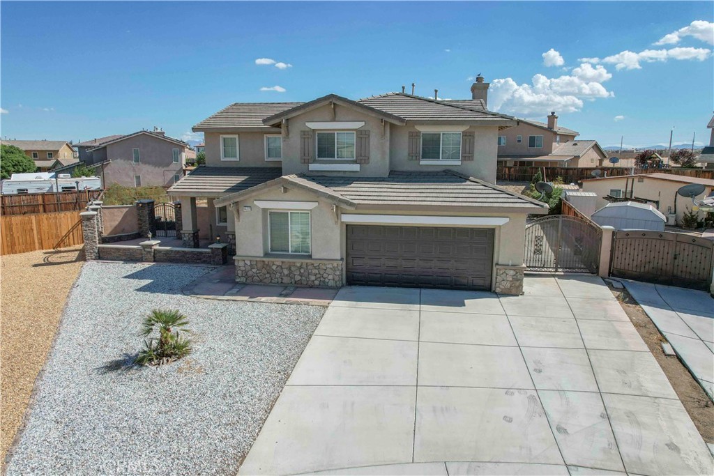 Beautiful Home on a Cul De Sac with a HUGE backyard with vehicle access. This floor plan has a perfect design for multi-gen living. The main floor has two large bedrooms with a full bathroom. One of the main floor bedrooms has direct access to the exterior. The interior has a fresh coat of 3 tone paint & new carpet throughout. Perfect for vehicles, RV's, haulers, trailers, toys, etc. Very minimal road traffic due to Cul De Sac, but less than 5 minutes away from main highways, parks, schools, shopping, dining, etc. Brand new water heater & garage door were installed. The front yard is completely landscaped with decorative rock, an extended driveway (passes to backyard), block fence with stack-stone & wrought iron finishes. The backyard has a retention wall, hardscaping, & only requires a bit of customization to have a dream yard.