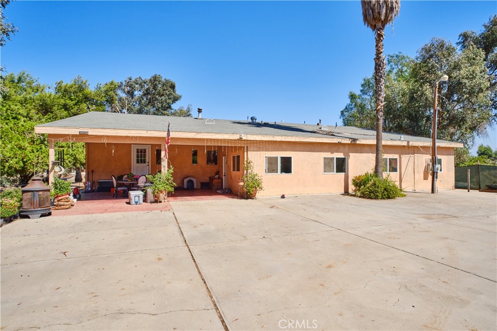 This unique property offers exceptional versatility with three separate living structures on-site, making it ideal for multi-generational living, rental income, or extended guest accommodations. 80 fruit Trees and 20 Palm trees, Each unit provides its own distinct charm and functionality, with private entrances, kitchens or kitchenettes, and comfortable living spaces. Whether you're looking to invest, live in one unit and rent the others, or create a family compound, this rare setup delivers flexibility and opportunity. Situated on a spacious lot, there's ample room for outdoor living, parking, and potential expansion—all in one convenient location.