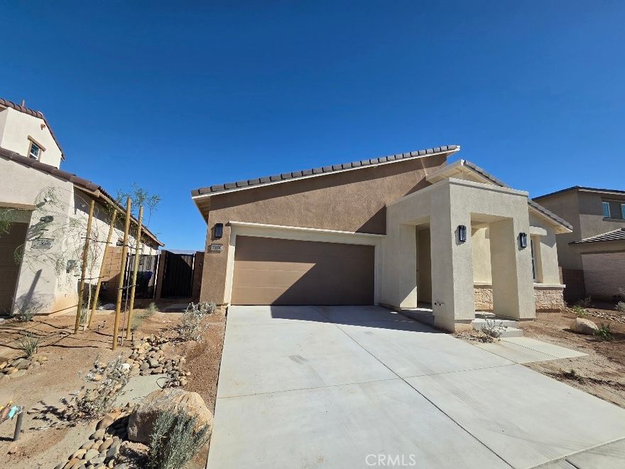 NEW CONSTRUCTION - SINGLE-FAMILY HOMES – NEW COMMUNITY! - Welcome to The Collection at Sage, a beautiful, gated, detached home community located in the city of Palm Desert. Featuring one and two-story homes ranging from to 1,750 sq. ft. to 2,312 sq. ft., with up to 4 bedrooms and 3 bathrooms, The Collection at Sage offers desert lifestyle living at its best with a sparkling community pool, clubhouse, fitness center and more! The Residence 1942 offers a light and airy, open concept design offering 1,942 sq. ft with a long entry that sets the stage for this beautiful floor plan. Two good-sized bedrooms 2 and 3 are situated in the front of the home with a convenient full-sized bathroom in between. Then the home opens to a spacious Great Room, Kitchen and Dining space perfect for entertaining, and leads to a lovely outdoor covered patio to extend the celebrations outside! The gourmet Kitchen features stainless-steel appliances including cooktop/oven, dishwasher, and microwave, quartz kitchen counter tops and large island. Situated at the back of this home is the Primary Bedroom and Bath, which feels like an expansive, private retreat for relaxing and unwinding, and the large Bathroom offers a beautiful walk-in shower and walk-in closet to be envied! The nicely-sized back yard waits for your imagination! Among the features and finishes, homeowners will appreciate the unparalleled peace of mind in owning America’s Smart Home, Home is Connected, which provides smart home features all conveniently controlled through one application to stay connected to home around the clock.