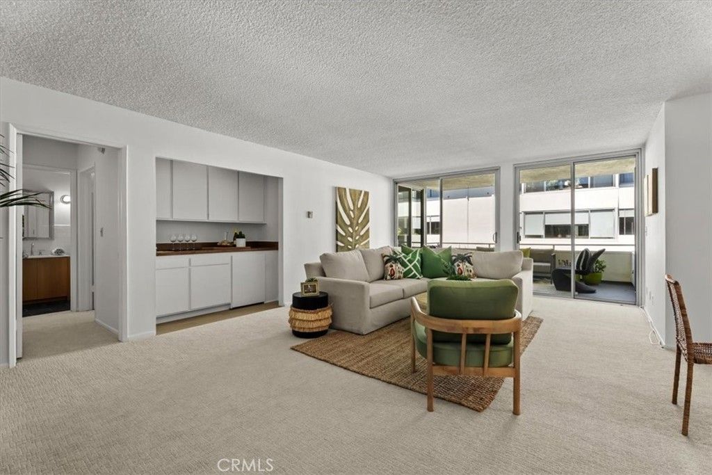 Photo of 8701 Delgany Ave #205, Playa Del Rey, CA 90293 (MLS # SB26090440)