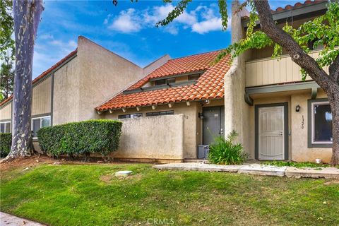 Photo of 1312 Camelot DR, Corona, CA 92882 (MLS # SW26087096)