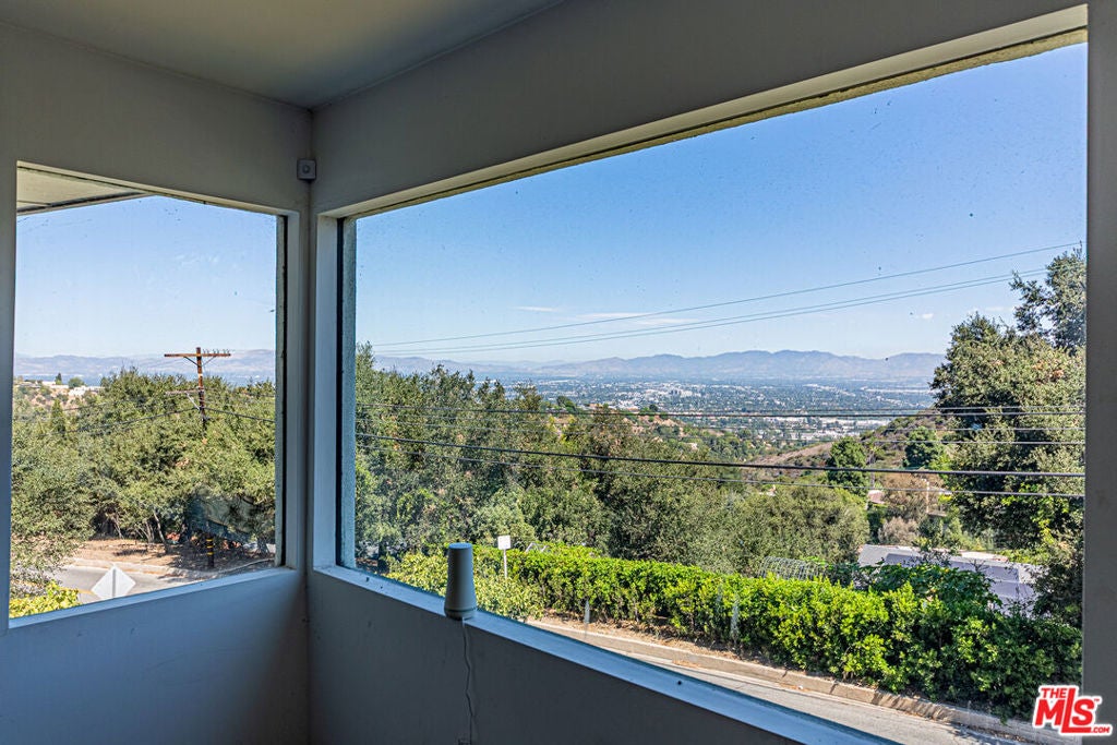 14301 Mulholland Drive, Los Angeles CA 90077
