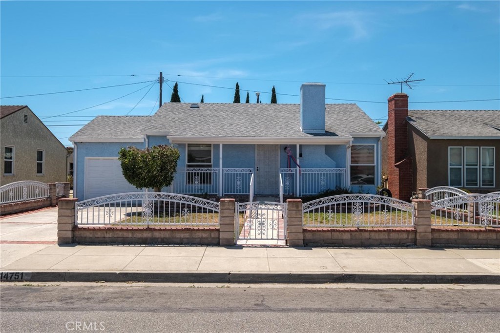 Welcome home to this charming 3-bedroom, 2-bath residence nestled in Gardena’s desirable McCarthy area. Offering over 1,200 square feet of comfortable living space on a 5,000+ square foot lot, this well-maintained home features vinyl flooring throughout and an open living room with a cozy fireplace, perfect for relaxing evenings. The spacious dining area flows into the updated kitchen with granite counters and modern cabinets, making meal prep a delight. The home also offers a separate laundry/utility room for added convenience, ceiling fans throughout, and a tiled, spacious bathroom. Step outside to your private backyard with a raised deck and open patio cover, ideal for summer BBQs and quiet mornings. A one-car attached garage with driveway parking completes the home. Conveniently located near parks, schools, shopping, and within close distance to El Camino College, this inviting property is ready for you to move in and make it your own!