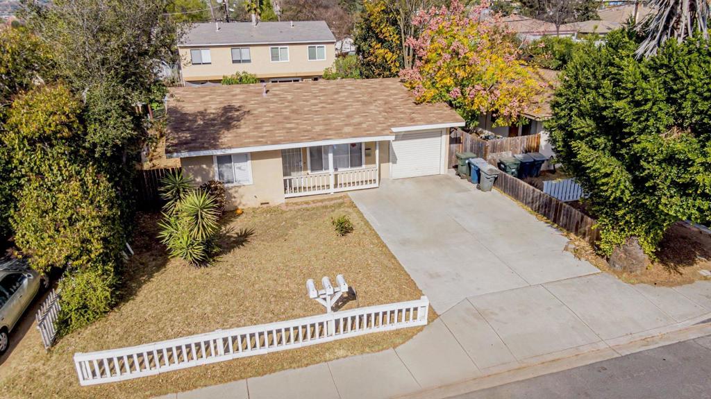 This unique property offers the perfect blend of income potential and functional living, making it an excellent choice for investors and multigenerational households alike. Situated on a 7,376 sq. ft. lot, the property includes a front Detached Single-Family Home with an attached garage, along with two spacious, two-story Townhouse-Style Units located at the rear. Each residence features its own private yard, dedicated parking (including a driveway for the front home and alley-accessed carports for the townhomes), and in-unit laundry—providing comfort and independence for each household. Whether you're looking to generate strong rental income, house extended family, or enjoy both at once, this flexible setup offers exceptional options. Live in one unit and lease the others, or accommodate multiple generations under one property while maintaining privacy and autonomy. Nestled on a quiet residential street, the property is conveniently located just one mile from the vibrant Maple Street Plaza and downtown dining, and only half a mile from major retailers like Home Depot, Walmart, and local grocery stores. With Escondido boasting a 6.89% average annual appreciation rate, this property is not only a smart long-term investment but also a practical solution for today’s evolving living needs. Whether you're growing your portfolio or bringing loved ones closer together, this rare opportunity delivers both value and versatility in one of North County’s most promising markets.