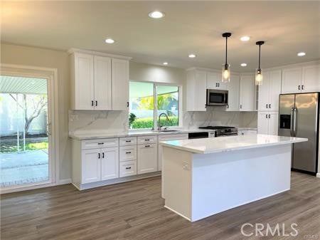 Photo of 3421 Rowena Drive, Rossmoor, CA 90720 (MLS # PW26215642)