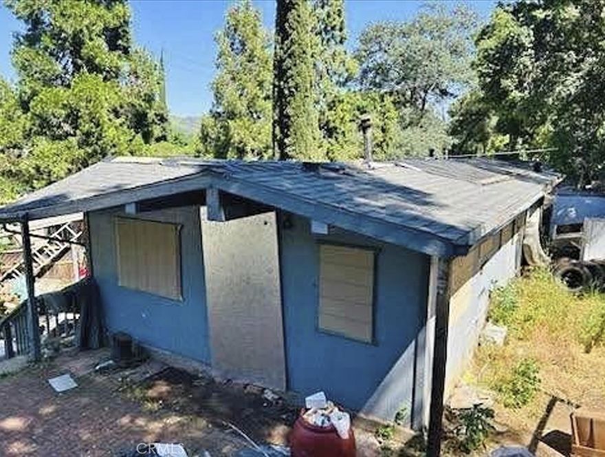 Structurally sound SFR (not a mobile) on its own land, with all city utilities (water, sewer, and PG&E) connected and included in the purchase. Located in town with convenient access to local amenities. The home will require renovations to realize its full potential and is priced accordingly. Offers strong value when considering the cost of land, utility connections, and existing structure.