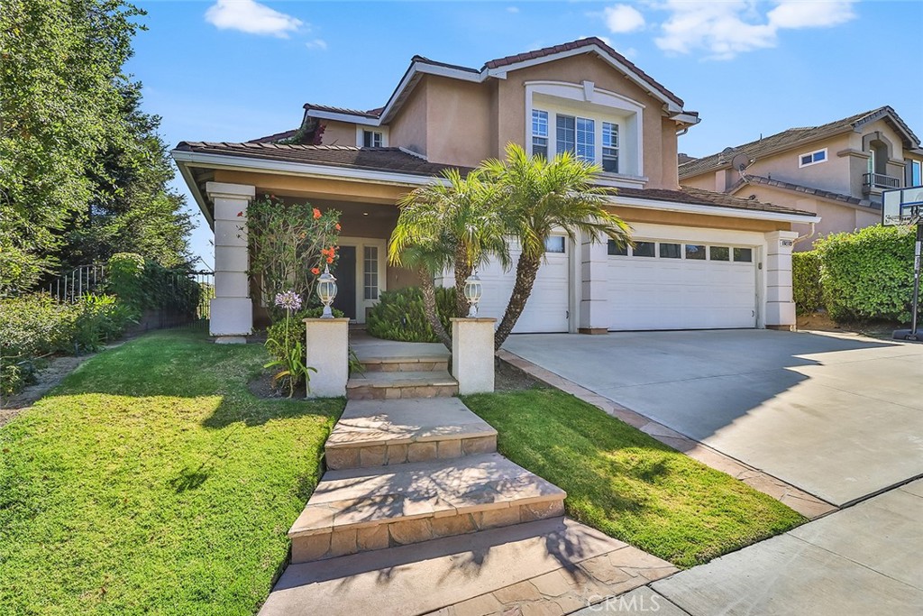 Nestled on a quiet street of a Thousand Oaks gated community is a view-filled 5-bedroom 3-bathroom home for rent. As you step inside, you’re greeted by a bright & open space featuring double height vaulted ceilings with French windows top to bottom, a stunning spiral staircase, 2 elegant crystal chandeliers, & remodeled Nigerian pecan hardwood flooring. The upgraded kitchen includes remodeled Caesarstone countertops & center island, iridescent glass tile backsplash, a roomy pantry, & stainless-steel, Energy Star appliances. The well-lit den is lined with windows that look out to the serene backyard where you can dine alfresco while soaking up panoramic mountain & city views of the Conejo Valley. On the 2nd level, the primary bedroom includes a chic crystal chandelier, dual closets, & a tranquil balcony to take in more mountain-filled views while enjoying your morning cup of coffee. The spacious & airy primary bathroom has mirrors throughout, plenty of counter space, & large windows that showcase more scenic views to appreciate during your shower or bubble bath. The remaining upstairs bedrooms include newly installed ceiling fans, upgraded custom built closets, and are all well-sized, with one being just as large as the primary bedroom. The Rancho Conejo community allows for peace of mind with security standing guard 24/7 at both gates, and features a large grass-filled park with newly upgraded playground, picturesque paths for jogging, and 2 recently renovated swimming pools heated year-round, one of which is just a short walk around the corner. With endless features such as a newer HVAC unit, updated full home water filtration system, laundry room with Maytag high efficiency front loading washer & dryer, 3-car garage with an additional refrigerator, newer paint with dramatic accent walls, smart lighting, Nest doorbell & thermostat… this property is a true gem and ready to be rented!