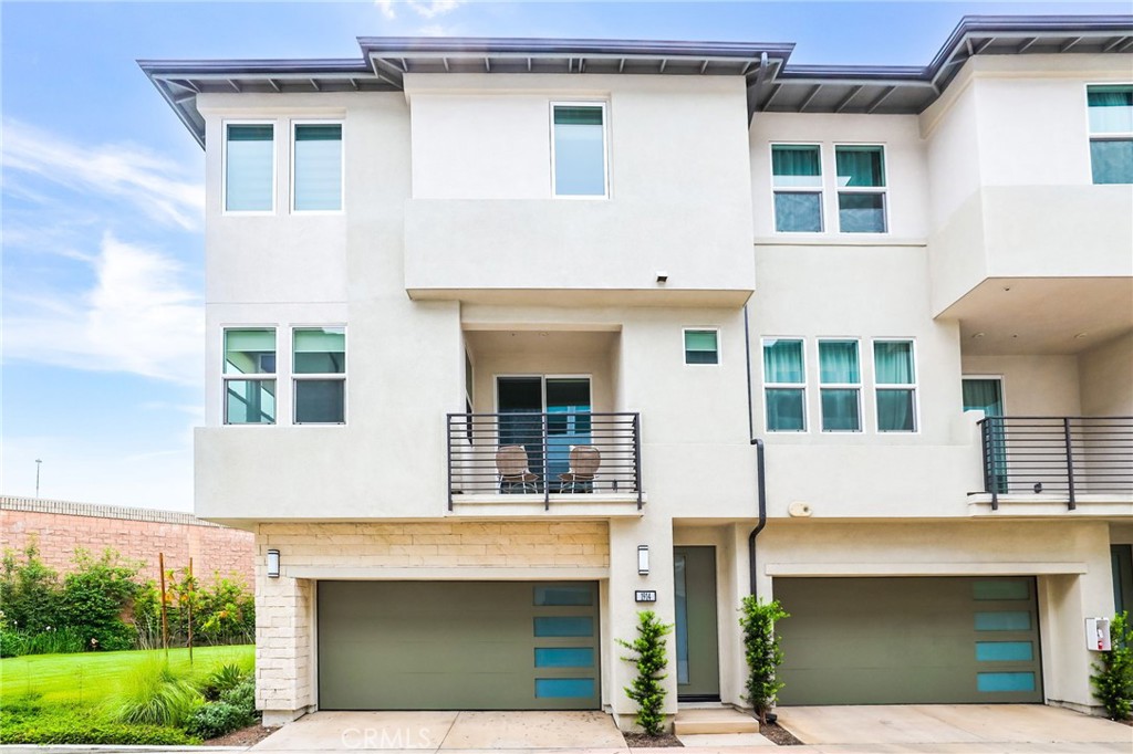 Toll Brothers GATED community at 100 West in Anaheim. This contemporary luxury Three Story Townhouse offers 3 bedrooms, 2.5 baths. Open Floor plan with lots natural Lights. Premium kitchen appliances, refrigerator, washer & dryer are also included. The second level has a powder room, great room with balcony off the living room area and gourmet kitchen with island and soft closed cabinets as well as luxurious Vinyl flooring through out. Third level has a master bedroom suite with walk-in closet, a secondary and Third bedrooms plus a laundry area. The Community is centrally located in the heart of Orange County minutes to major entertainment & shopping centers such as Disneyland, Honda Center, Angel Stadium, & Anaheim Garden Walk. Easy & convenient access to excellent medical centers, college campuses, major freeways & transportation hubs. 2 Car Direct access Garage.