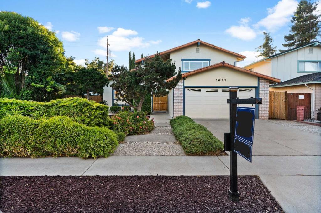 Welcome to this beautifully updated 4-bedroom, 2.5-bathroom home nestled in the vibrant heart of San Jose. Offering 1,822 sq ft of comfortable living space with room for every lifestyle. There is plenty of parking for your RV, Boat or other fun equipment. This residence features a thoughtful and functional layout ideal for modern living. The inviting living room seamlessly connects to a designated dining area, perfect for family gatherings or entertaining guests. A cozy fireplace adds warmth and charm to the large Family room where family and friends can relax and enjoy time together. The well-appointed kitchen has quality upgraded cabinets with glass fronts and a granite counter top and new light fixture. The oven/stove range is brand new. The bottom floor has beautiful wood floors, a large bedroom & half bath that can be converted into a full bath for multi generational living. All 3 bathrooms have new cabinets, and fixtures. The home was freshly painted with other updates added as well. Situated on an oversized, 6,500 square foot lot, this home allows for plenty of outdoor spaces to play, for kids and adults alike. This home combines aesthetic appeal with everyday practicality. With its fresh updates and smart design, this San Jose gem is ready to welcome you home.