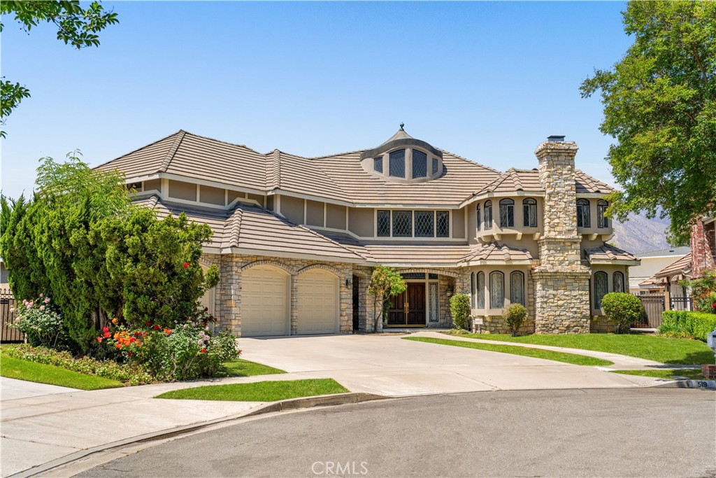 Stunning 5,500 Sq. Ft. Executive Home in Arcadia. This grand 5,500 square-foot home, built by Murisol Builders, is a stunning 4-bedroom, 4-bath executive-style residence located on a quiet cul-de-sac in Arcadia, within the highly sought-after Arcadia School District. The home features a spacious library with a nearby full bath and closet, making it a potential fifth bedroom for visiting guests or a fabulous professional office. The oversized family room, with soaring 20-foot ceilings, built-in cabinets, and shelving, offers a breathtaking view of the sparkling pool and spa. A beautiful wet bar enhances the space, making it an entertainer’s delight. The gourmet kitchen boasts a large island with a second sink, a breakfast bar, and an open layout that seamlessly connects to the informal breakfast area and family room. For more formal gatherings, the elegant living room with a fireplace and the separate dining room provide the perfect setting, with convenient access for serving. Ascending the dramatic circular staircase, you’ll find two spacious bedrooms sharing a full bath, along with the luxurious master suite. The master suite features a private balcony overlooking the pool and spa, a lavish en-suite bath, and an impressively large walk-in closet. Additionally, there is an upstairs loft area ideal for a second family room. Downstairs, the fourth bedroom and third bath offer direct access to the pool area, while the well-appointed laundry room provides ample storage and space for a side-by-side washer and dryer. The home also includes a three-car garage with additional space for a workshop. The beautifully designed pool and spa complete this remarkable home, providing the perfect place to relax and entertain. This spacious and elegant residence is truly a rare find!