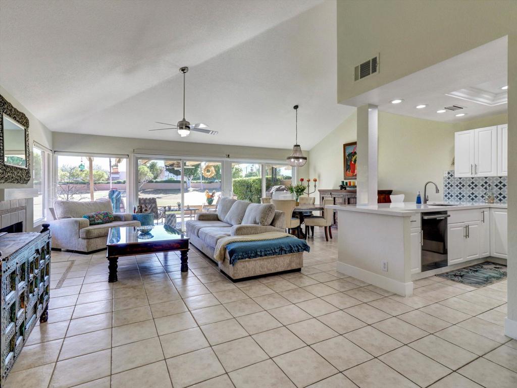 Discover the perfect seasonal escape at Woodhaven Country Club, where comfort meets resort-style living. This beautifully furnished residence at 77897 Woodhaven Dr S offers the ideal blend of elegance, relaxation, and convenience in the heart of Palm Desert. Located directly across from the pool and mailboxes this property features a spacious open-concept layout, natural light and stunning golf course views. The stylish living room flows effortlessly into the dining area and updated kitchen, complete with modern appliances, ample cabinetry, and breakfast bar seating--perfect for entertaining or unwinding after a day on the course.Step outside to your private patio overlooking lush fairways and mature palm trees, where tranquil desert evenings and vibrant sunsets create unforgettable memories. Inside, two generously sized bedrooms, including a comfortable primary suite with ensuite bath, provide the perfect retreat for rest and rejuvenation. Additional features include a second full bathroom, in-unit laundry, and attached garage for convenience.As part of the gated Woodhaven community, residents and guests enjoy access to premier amenities: championship golf, tennis and pickleball courts, fitness facilities, heated pools and spas, and a welcoming clubhouse with dining options. Ideally located near El Paseo shopping, fine dining, and world-class entertainment, this seasonal rental places you at the center of desert lifestyle.Disclaimer: Advertised rate of $2,700/month applies to summer months only. Rates vary by season and length of stay. Please inquire for current availability and pricing. Available for 2026 season