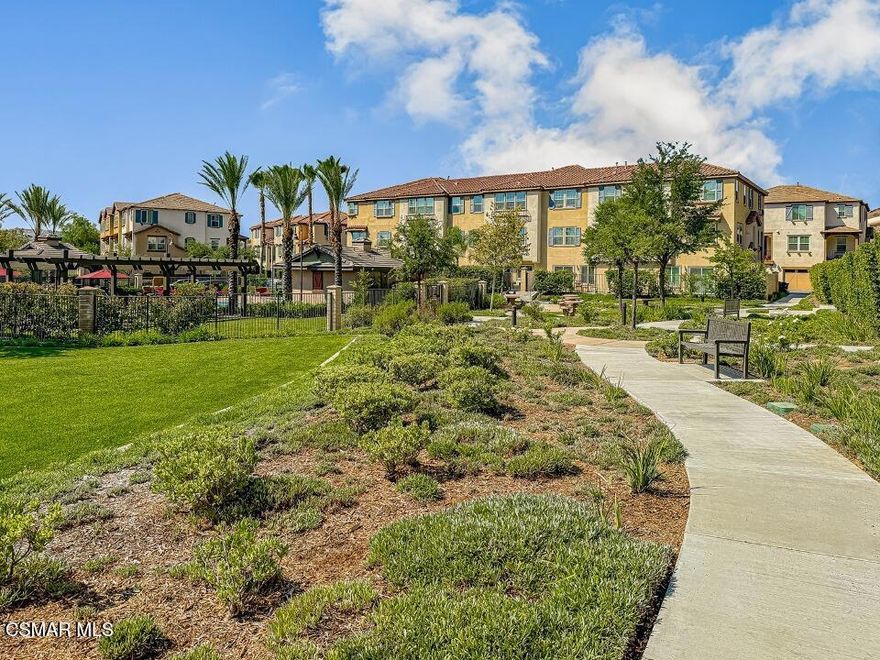 One lucky buyer is about to score the deal of the neighborhood. Priced at just $300 per square foot, this home sits far below recent comparable sales at $780K-$805K--an incredible opportunity to own in the highly sought-after River Village community, one of the few warrantable townhouse developments in the Santa Clarita Valley.Built in 2016 by Beazer Homes, this residence lives like a standalone home and showcases several of the builder's premium upgrades, including upgraded flooring, a granite kitchen island, designer faucets, and under-cabinet lighting that elevates the entire kitchen experience.The entry level offers direct access to the attached two-car garage and a private bedroom with its own en-suite bath--ideal for guests, in-laws, or multigenerational living. This level also opens to a cozy outdoor space perfect for morning coffee or evening relaxation.Upstairs, natural light pours into the open-concept great room, where the upgraded kitchen features Energy STAR appliances and custom cabinetry. Recessed lighting and ceiling fans create an inviting ambiance throughout. This floor also includes a full bedroom and bathroom, along with a covered deck for year-round enjoyment.The top level is anchored by a spacious primary suite complete with dual sinks, a soaking tub, separate shower, and generous walk-in closet. Two additional bedrooms share a convenient jack-and-jill bath, and the laundry room is thoughtfully located on the same level.Additional features include a tankless water heater and Beazer's Energy STAR certification for long-term efficiency and comfort.River Village residents enjoy resort-style amenities--pool, spa, playground--all within a secure, gated community close to shopping, dining, and easy freeway access.Some images have been digitally enhanced.