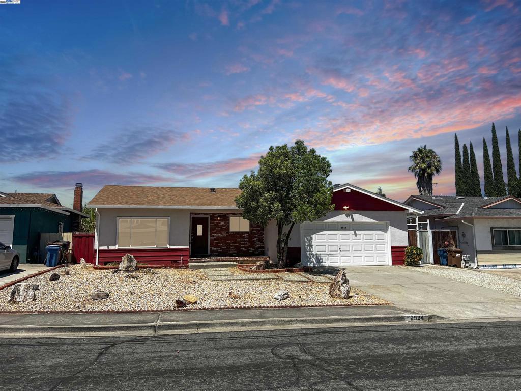 Discover this spacious 4-bedroom, 2-bath ranch-style home nestled on a serene cul-de-sac in the coveted Mira Vista neighborhood. Built in 1968 and offering 1,707 sqft of comfortable living space on a generous 8,450 sqft lot, this home combines classic charm with modern convenience. Step inside to find an inviting floor plan with a warm wood-burning stove and forced-air heating and central A/C, delivering cozy comfort year-round. Dual-pane windows throughout enhance energy efficiency and quietude. The heart of the home is its living area—perfect for family gatherings—flowing seamlessly into a functional kitchen equipped with laminate counters, pantry, and all included appliances (dishwasher, electric range, microwave, refrigerator, and disposal). Retreat to any of the four comfortable bedrooms, served by two full bathrooms. The home also offers a practical laundry setup in the garage, including washer, dryer, and garage access. Enjoy outdoor life on the relaxing covered patio, overlooking a large, fenced backyard—ideal for entertaining, gardening, or relaxing in private outdoor space. Convenience is at your fingertips—with nearby shopping, freeway access, and a coveted cul de sac location! Come fall in LOVE