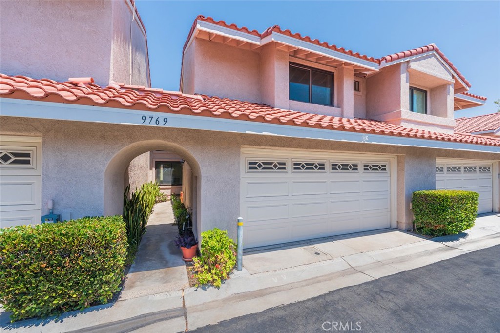 BEAUTIFUL and Spacious 2 Bedroom, 2 and half Bathroom unit on a very Desirable, Interior street location in the Highly Sought After MARIPOSA Community. Attached 2-Car Garage allows Direct Access into the Home. Tastefully tiled flooring downstairs, Neutral carpeting upstairs. High cathedral ceilings create an Open, airy environment with a lot of Natural Light. Half Bathroom Downstairs. Large windows in Kitchen and Living Room; Wide Sliding Glass Door from Living Room and Glass Door from Kitchen opens to the Sunny and Spacious, Private Back Patio Area. Upstairs, you will have the 2 Large Bedrooms with their Own Bathrooms; both with high, vaulted ceilings, Mirrored Closet Doors and Closet Organizers. Keep cool with Central A/C. Mariposa Community boasts a Large, Resort Style Community Pool and Spa, surrounded by wonderfully maintained Private and Professional Landscaping. This community is very conveniently located; within Walking Distance to Grocery Stores, Restaurants, easy 405 Freeway Access, surrounded by and within the Award-Winning Fountain Valley Schools. And yes, you can feel the Ocean Breezes from the south, approximately 4 miles away from the Beach!! You'll never want to move away from this Luxurious Life Style!