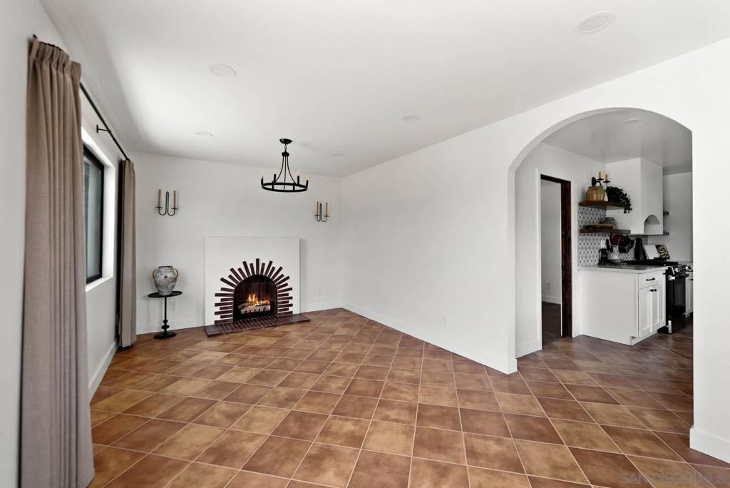Live in the charm of classic Spanish architecture with the comfort of a full modern renovation! This beautifully updated 3-bedroom, 2-bathroom home is located in Logan Heights — just 5 minutes from East Village and downtown San Diego. Custom saltillo tile floors, arched details, custom tiles, and a stunning decorative fireplace create an inviting warmth, while the sunlit kitchen features fresh quartz countertops and stylish finishes. Every inch of this home is brand new, from the electrical and plumbing to the double-pane windows and solid wood interior doors. 1 car garage with driveway. Washer & Dryer included. Enjoy a spacious fenced yard with a private courtyard — perfect for morning coffee or evening gatherings. Note: Not shown in photos is garage space with washer & dryer. Designed with love for your family to enjoy! Rental Terms: 12 month lease No smoking Tenant is responsible for Gas & Electric Pets are allowed w/ restrictions Minimum 650 Credit Score Available Now!