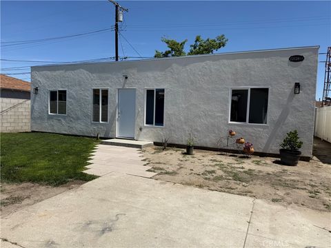 Photo of 12128 Alvaro St, Los Angeles, CA 90059 (MLS # IV26088286)