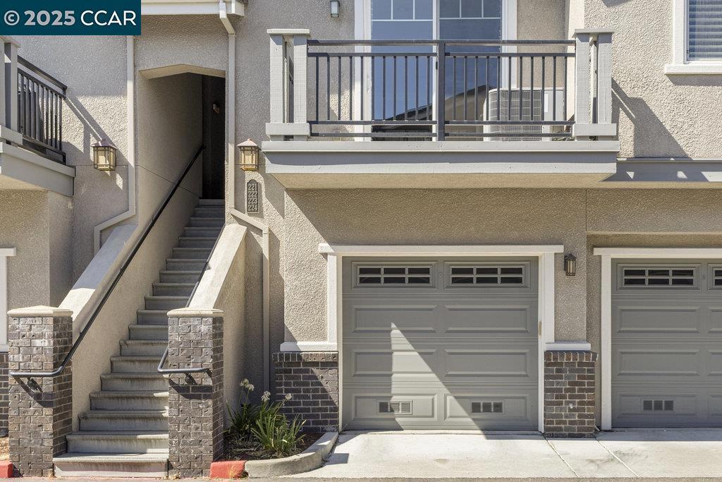 Great Opportunity in Danville at a Great Price! Why rent when you can buy! Beautiful updated 2 bedroom 2 bath condo with an open floorplan, high ceilings, hardwood floors, fresh paint, plantation shutters, and fully equipped kitchen with granite counters, breakfast bar, stainless steel appliances, and abundant cabinetry. Living/Dining area has its own balcony perfect for morning coffee. Primary suite features an ensuite bathroom and walk in closet. This single story unit has wonderful natural light, in unit washer and dryer, a one car garage and deeded second parking spot. HOA covers exterior maintenance, water, and trash service. Located in the highly rated San Ramon Valley School district with easy commutability to freeways, shopping, dining and the coveted Iron Horse Trail.