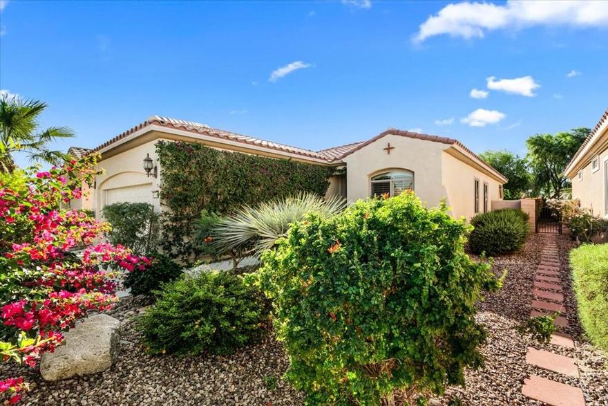 Charming South-Facing SerrentePriced to Sell at $405,000!Welcome to 81543 Avenida de Baile located in the highly sought-after Sun City Shadow Hills. This beautifully maintained Serrente offers 1,488 sq ft of comfort, style and value all in one. South-facing and filled with natural light, this home is a perfect blend of functionality and charm.Step inside to find ceramic tile flooring throughout all living areas with plush carpet in the bedrooms for added comfort. The kitchen is a true highlight, featuring granite countertops, stainless steel appliances, a center island with breakfast bar, ample cabinetry, a pantry and a bonus butlers pantry, ideal for entertaining and extra storage. Every room is equipped with overhead ceiling fans, including the covered patio, to keep you cool year-round. LED track lighting adds a modern touch and perfectly showcases your art and decor. All ceiling lights have been switched out to LED lighting too. Plantation shutters and an invisible screen on the front door provide both privacy and ventilation.Enjoy the extended concrete patio in you inviting backyard, perfect for outdoor dining or relaxing in the sun or shade. Additional features include a newer Air conditioning unit (5 years new)n hewer microwave, LED lighting throughout, an added linen closet, and a layout designed for easy living.This is a fantastic opportunity to own in one of the area's most popular communities,.  Be here for this season. Don't miss out!