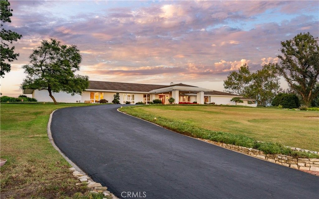 Photo of 34 Crest Rd E, Rolling Hills, CA 90274 (MLS # PV25243012)