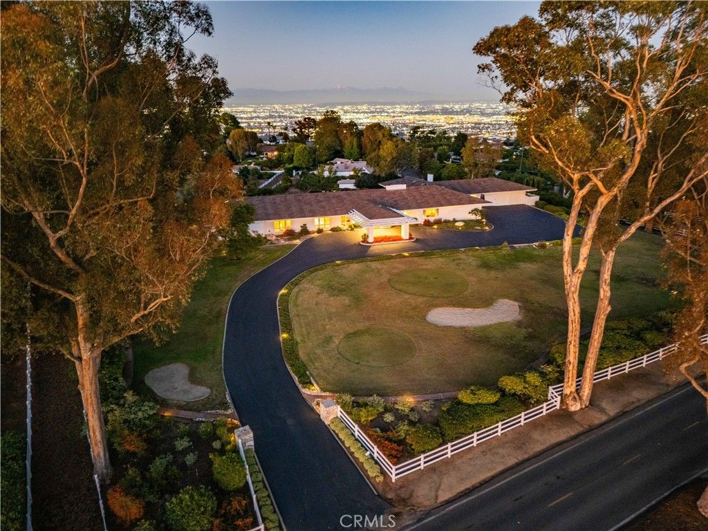 Photo of 34 Crest Rd E, Rolling Hills, CA 90274 (MLS # PV25243012)