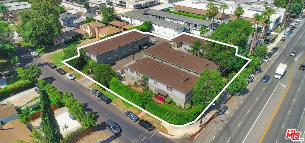 Great opportunity to own a 28-unit apartment building in an excellent Valley Village location. Located just East of Laurel Canyon Blvd, the property is close to the NoHo Arts District, Los Angeles Valley College and just minutes to North Hollywood Metro Rail Station. Built in 1956, the property is subject to rent control. There is an attractive unit mix of 23 Two-Bedroom/One-Bath Units, Four, One-Bedroom/One-Bath Units and One Single. The property is situated on a large lot on the corner of Burbank Boulevard and Radford Avenue. Residents enjoy the low density feel as well as amenities such as BBQ picnic area, bike racks, gated covered and uncovered parking (43 total spaces), nicely landscaped courtyard, and an on-site laundry facility. With good upside in rents, a new owner can continue to renovate units and increase cash flow as units turn. Furthermore, there is potential to redevelop the property given the corner location and large33,748- SF Lot, Zoned LAR3***The LA City Soft Story Retrofit work has been completed (Buyer to Verify)