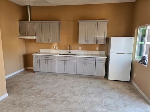 Photo of 18995 GENTIAN Avenue, Riverside, CA 92508 (MLS # IG26077472)