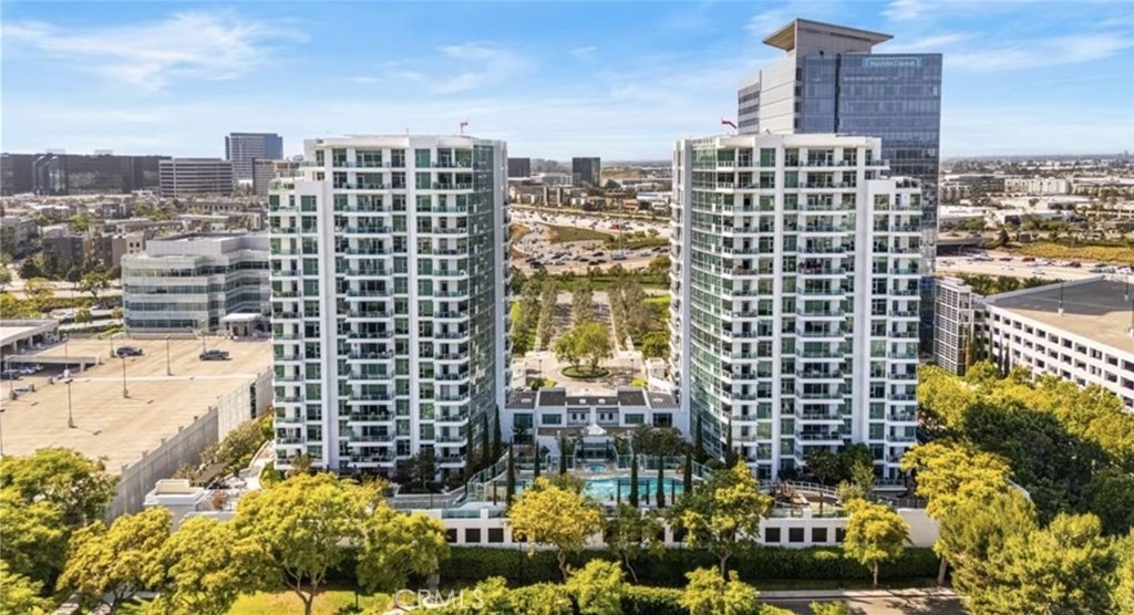 Welcome home to Luxury Living in this prestigious unit, Irvine's finest high rise, Resort style condo at the Marquee in Park Place. Located on the West tower, with views, facing away from the freeway. The Marquee also provides extra storage space separate from the unit and side by side parking in the secure parking complex. Enjoy hotel like amenities in the Marquee with 24 hour security and full concierge services, elegant lobby, state-of-the-art fitness center, heated pool & spa, BBQs, playground, theater room, billiard room, and professional business center. This spot is also walking distance to some of the BEST restaurants in town and close to UCI, Irvine Spectrum, John Wayne Airport, and a short drive to Fashion Island, the beaches, parks and nature trails. This spacious 1,234 sq. ft home flows openly from the living room, to the dining area and then on to the balcony where you can unwind after a long day and watch some of the best sunsets and exquisite garden views. Don't miss this opportunity to enjoy the city living.