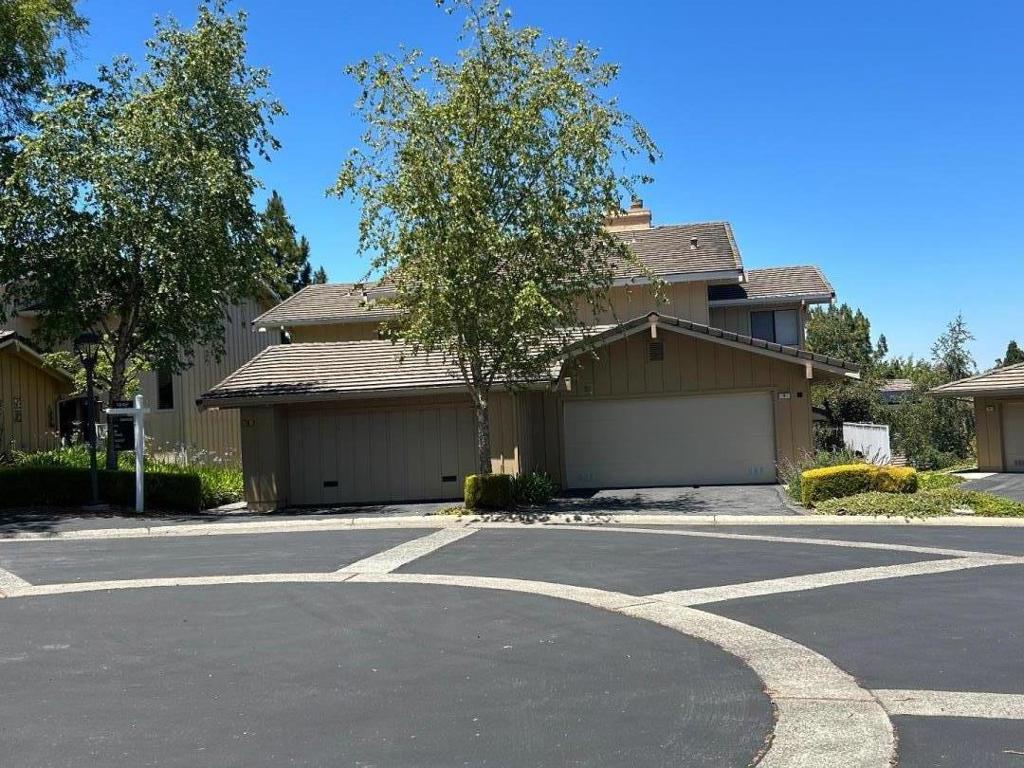 Town home located on a quiet cul-de-sac atop the San Carlos Hills with a split-level open floor plan with vaulted ceiling flowing to a garden patio. Great floor plan for living and entertaining. Two large bedrooms, each with their own baths. The living room area features a fireplace and opens to a Den area with a walk-in closet. The kitchen, adjacent to the dining area, offers plenty of cabinet and counter space and offers direct access to the two-car garage with Laundry area. Crestview Park is a community that provides residents with a Common Area Pool / Spa. Clubhouse, and 4 tennis courts. Easy access to highways 101 and 280.