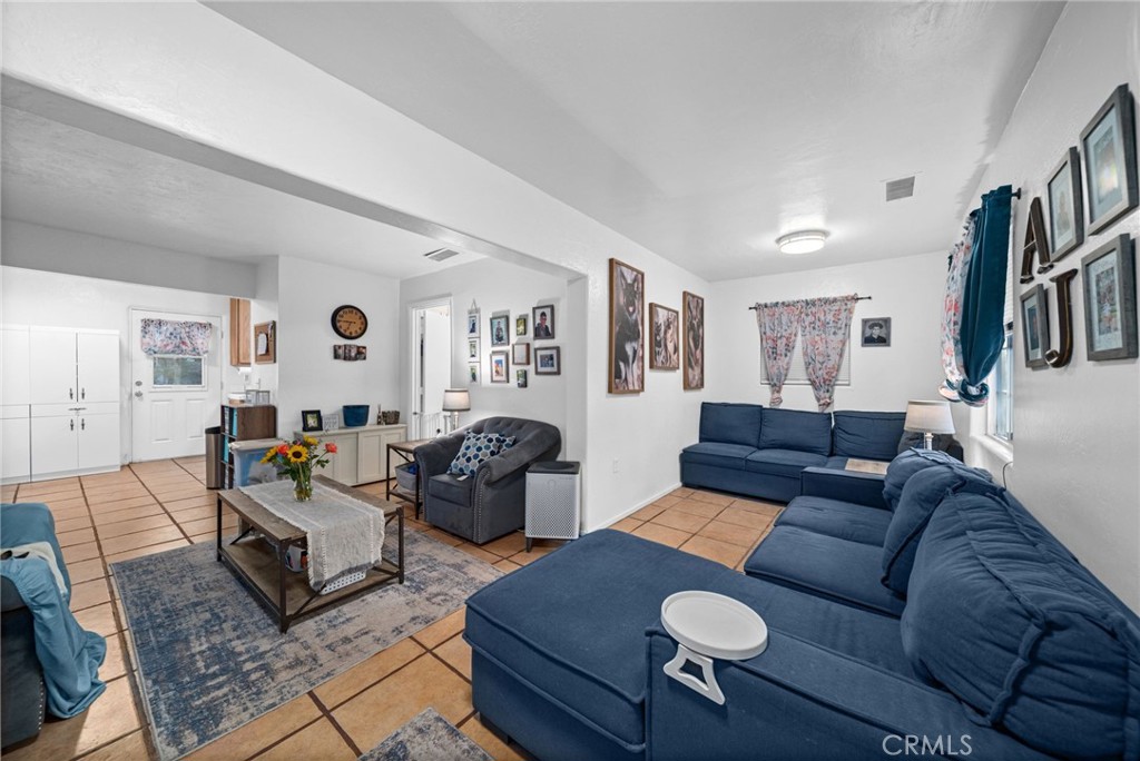 Welcome to 23755 Goetz Drive! A charming and affordable home full of potential in the heart of Quail Valley! Perfect for first-time buyers, investors, or anyone seeking a peaceful retreat, this 3-bedroom, 1-bathroom home offers 840 sq. ft. of comfortable living space on a generous 4,700+ sq. ft. lot. Step inside to discover a bright and inviting layout filled with natural light, creating a cozy and open feel. Outside, the spacious lot provides endless possibilities - garden, entertain, expand, or simply relax and enjoy your own outdoor retreat. Conveniently located just minutes from Canyon Lake, schools, shopping, and the 215 freeway, this property blends small-town charm with everyday convenience. Don’t miss this opportunity to own a piece of Quail Valley at an unbeatable price. Whether you’re looking to move in, update, or rent out, this home is ready for your vision. Come see it today and make it yours!