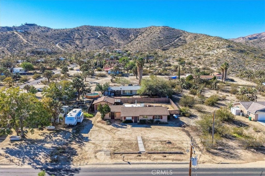Photo of 57613 Onaga Trl, Yucca Valley, CA 92284 (MLS # JT25245647)