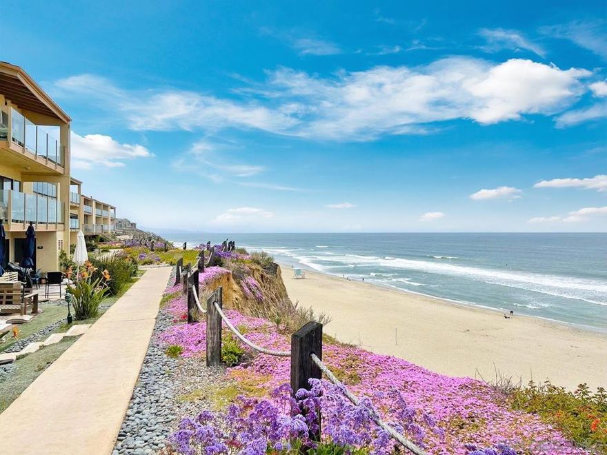 Live steps from the sand in this beautifully updated property, perfectly situated in the heart of Solana Beach—one of the nation’s most sought-after seaside communities. Just a short stroll to the ocean, this versatile home offers the ideal blend of a tranquil vacation retreat, an inviting primary residence, or a lucrative rental opportunity with both short- and long-term potential. Inside, you’ll find a thoughtfully renovated interior featuring stylish new cabinets and flooring throughout. The warm, welcoming living room with its cozy fireplace sets the stage for relaxed evenings or entertaining friends. With the added benefit of two parking spaces, convenience meets comfort at every turn. Location, location, location—walk to popular restaurants, unique shops, and the nearby Coaster/Amtrak station for effortless coastal commuting. The gated community further elevates the lifestyle with resort-style amenities, including multiple pools and jacuzzis, tennis courts, a recreation room, and calming koi ponds surrounded by lush landscaping. For added ease, this property is available furnished, providing a true turnkey opportunity—whether you’re ready to move right in or start generating rental income immediately. Don’t miss your chance to own a piece of paradise in one of California’s most coveted coastal destinations.