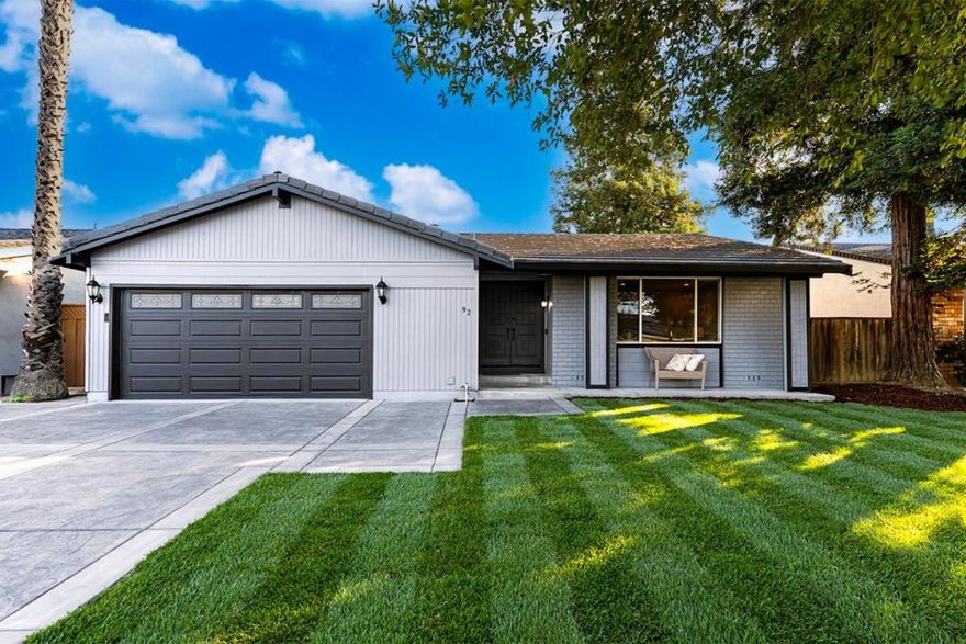 This spectacular north facing home has been beautifully remodeled with premium finishes and an incredible sense of style. Located in the desirable Hayes Mansion, Blossom Valley neighborhood, the bright and open floor plan features vaulted ceilings, fresh designer paint, and rich hardwood floors throughout. The modern kitchen showcases quartz countertops, stainless steel appliances, a gas range, and custom cabinetry. Enjoy abundant natural light through double-pane windows, recessed lighting, and French doors leading to the formal living room, while a separate family room centers around a cozy wood-burning fireplace. The remodeled guest bath features travertine stone tile and quartz counters, and the spacious primary suite offers backyard access and a luxurious en-suite with a gorgeous tiled shower. The backyard retreat is perfect for entertaining with a sparkling pool, hot tub, Brazilian hardwood deck & custom pergola. Additional highlights include a new cement patio and driveway plus an extra-wide garage with ample storage. Centrally located near Edenvale Park, Hayes Mansion, and Martial Cottle Park, this home is just minutes to Oakridge Mall, Costco, and Highways 101, 85, and 87. Simply stunning inside and out. Make your move before its too late!