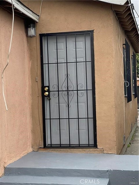 Photo of 1257 E 90th Street #1/2, Los Angeles, CA 90002 (MLS # OC26209668)