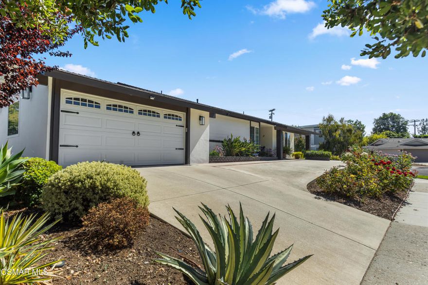 Located in the heart of the highly desirable Conejo Oaks neighborhood, this beautifully crafted single-story residence combines timeless elegance with modern comfort. Situated on a quiet cul-de-sac, this 4-bedroom, 3-bath home showcases quality craftsmanship, open living spaces, and a true sense of California indoor-outdoor living.Step inside to a spacious open-concept kitchen featuring fresh interior paint, custom cabinetry, stone countertops, and designer finishes throughout. The home's inviting interiors include hardwood flooring, ceramic/stone tile, and a travertine fireplace that creates a warm focal point in the main living area. Crown molding, plantation shutters, and custom detailing add sophistication to every room.The backyard is expansive and private, offering ample room for a pool, entertaining, and enjoying the sunshine. Enjoy a lush garden atmosphere with numerous fruit trees, including lemon, lime, fig, avocado, blood orange, and more. The front yard provides RV access and extra parking, adding both convenience and flexibility.Located within the award-winning Conejo Valley Unified School District, this home provides access to top-rated schools, parks, shopping, dining, and all the amenities Thousand Oaks has to offer.