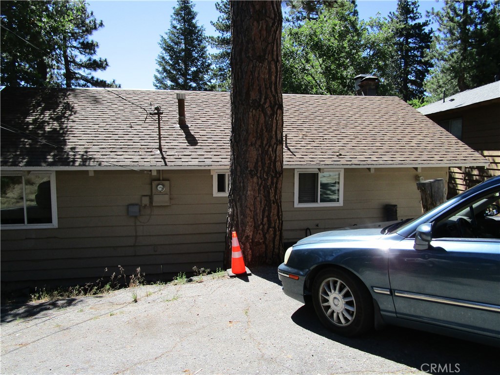 Discover Your Mountain Escape: Nestled in the picturesque San Bernardino Mountains at approximately 6,000 feet, offers an exceptional opportunity to embrace a tranquil mountain lifestyle or invest in a thriving short-term rental market. This charming 3-bedroom, 2-bathroom home, spanning 1,296 square feet on a generous 7,425 sq ft lot, presents a perfect blend of comfort, modern upgrades, and convenient access to Southern California's premier mountain attractions.
Step inside this thoughtfully remodeled residence, where modern amenities meet cozy mountain living. This home boasts:
* Recent Renovation: Completely remodeled, featuring dual-paned windows and doors for optimal energy efficiency, newer plastic piping for longevity and lower energy costs, and a tankless water heater providing instant hot water and further energy savings.
* Gourmet Kitchen: The heart of the home features soft-close cabinets, elegant granite countertops, and a full suite of stainless steel appliances, including a 5-burner gas range, dishwasher, microwave, and an extra-deep stainless steel sink.
* Comfort & Style: Both bathrooms echo the kitchen's quality with matching cabinetry and granite counters, along with updated sinks, toilets, and showers. Throughout the home, you'll find newer floors, light fixtures, recessed lighting.
* Cozy Living Spaces: The living room, opens to the kitchen, is enhanced by a wood-burning fireplace, pre-wiring for a flat-screen TV above the mantel, a beautiful custom skylight, and French doors that open to a new deck – perfect for enjoying the crisp mountain air.
* Private Primary Suite: The spacious primary suite offers its own wood-burning fireplace and French doors leading to a large backyard, creating a private retreat.
* Bonus Room: In addition to the three bedrooms, a versatile bonus room provides extra space for an office, den, or additional sleeping quarters.
* Outdoor Living: The property features a deck, patio, and porch, ideal for entertaining or simply relaxing amidst the peaceful neighborhood and tree views.
* Ideal for Investment: With its appeal as a vacation destination, this property presents a perfect opportunity for a Bed and Breakfast (BNB) or a second home getaway, offering strong investment potential in a desirable area.