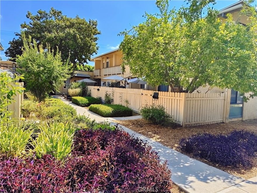 Here's a rare opportunity to own a beautiful townhome located in a desirable private gated community. Welcome to peace and serenity viewing a nice greenbelt in a quiet setting of park-like grounds. The open floor plan has vaulted ceilings, updated kitchen with newer counters, a fabulous primary suite with a walk-in closet, private bath + a large balcony for relaxation. Also, unit has newer AC, heat and ductwork. Double attached side by side 2 car garage and allows direct entry into the unit. The complex offers well-kept grounds, greenbelts, sparkling pools, children’s pool, playground, clubhouse, pet friendly + more. You will enjoy a premiere location, convenient to major transportation routes, hospitals, schools, CSUN (Calif. State University Northridge), freeways, restaurants + more. Enjoy the ideal combination of comfort, functionality, and lifestyle in this inviting townhouse.