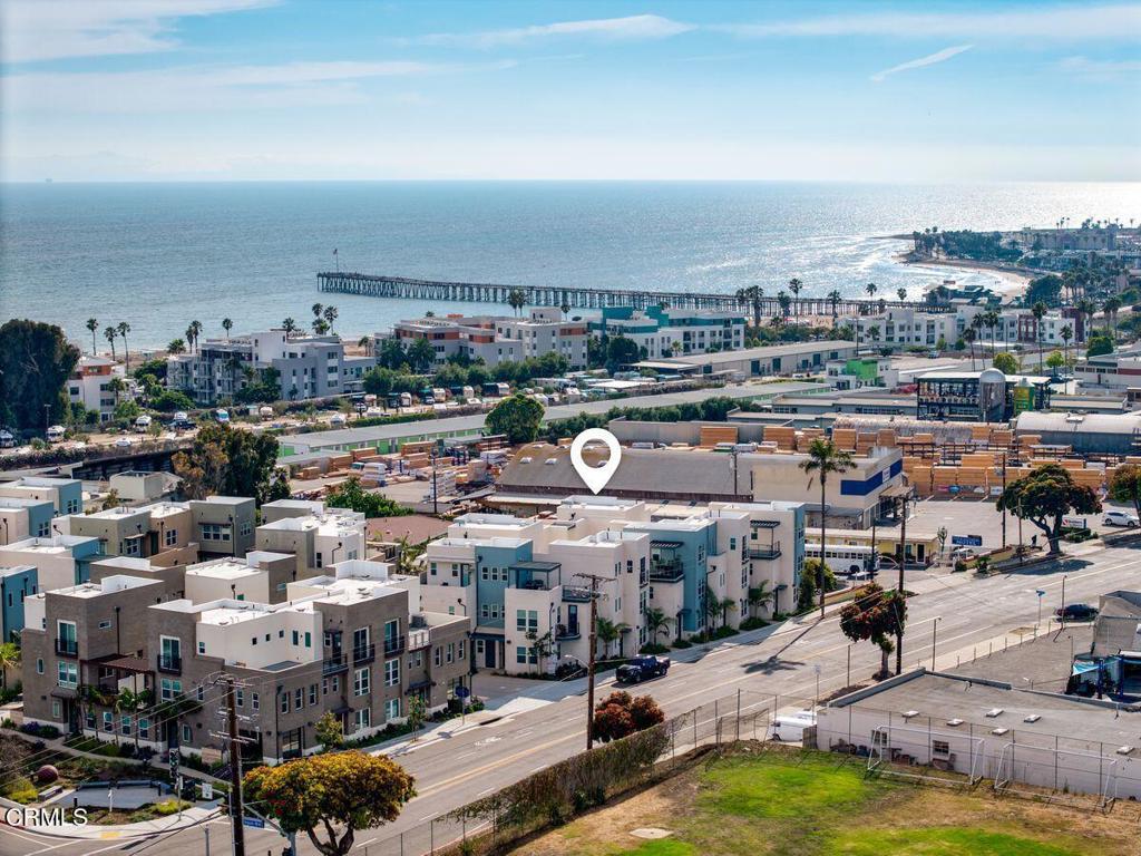 Welcome to The Pearl, a newly built community in the heart of Midtown Ventura, just a quarter-mile stroll to the beach and less than a mile from the charm of Downtown. This stunning Plan 2 townhome blends sleek, coastal-inspired architecture with an open-concept design, upscale finishes, and OCEAN VIEWS from almost every room. The luxurious primary suite, your private retreat complete with a spacious walk-in closet and elegant en-suite bath. With a location like this, checking the surf can be one of the very first things you do-right from your own bedroom or one of your 3 balconies.The bright, airy main living area flows effortlessly into a contemporary kitchen featuring stainless steel appliances, quartz countertops, and a private deck--ideal for relaxing, entertaining, or just enjoying that ocean air. The experience is completed by an installed Sonos speaker system. Additional upgrades include: (Full list available) -Luxury Vinyl Plank throughout living spaces and bedrooms. -Upgraded backsplash -Added storage in primary en suite and upgraded mirrors-Soft close cabinetry -Double Elkay Sink-Tap/sensor Moen kitchen faucet -Electric fireplace and wiring for EV Charger-Custom, top-down- bottom-up window coverings Don't miss this rare opportunity to own a new construction townhome in one of Ventura's most desirable neighborhoods- with a view! Walkable to the beach and downtown, it's hard to beat!Modern style, ocean views, and coastal convenience--The Pearl has it all.