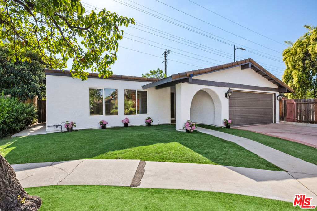 Charming Spanish-Style Retreat on a Quiet Cul-de-Sac in Tarzana, this beautiful home offers warmth, character, and endless possibilities. Featuring 3 spacious bedrooms and 2 bathrooms, over 1600 sq ft, the light-filled living room flows seamlessly into a cozy dining area and functional kitchen perfect for everyday living and entertaining. The highlight of the property is the expansive backyard, offering ample space to relax, garden and plenty of play area for kids and pets. Enjoy dining Al Fresco in your own Gazebo. A great place to call home! Located just minutes from Ventura Blvd's shops and restaurants, this home blends tranquility with convenience in one of the Valley's most desirable neighborhoods.