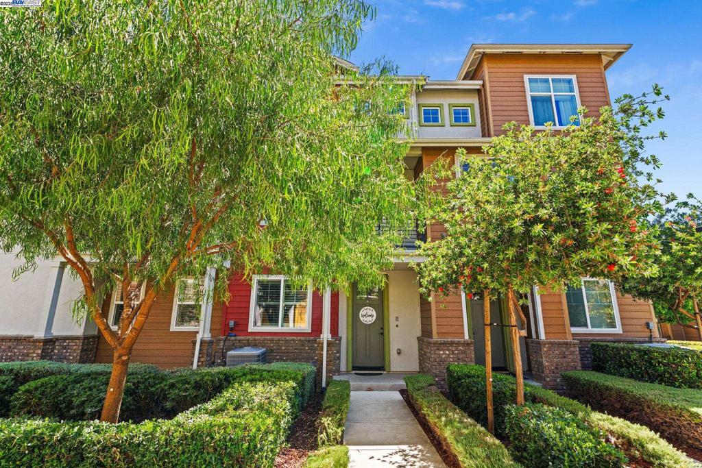 Tucked away in one of the most private and sought-after locations in the community, this stylish home offers peaceful views of the park and features 3 bedrooms and 3.5 bathrooms. The entry level features a private bedroom, a full bath plus a dedicated laundry room and direct access to the oversized two-car garage with two windows, complete with an EV charger. On the second floor, you will find an open concept great room with a sleek, upgraded kitchen featuring quartz countertops, a designer backsplash, GE Café appliances, breakfast bar seating, and modern lighting. The adjoining dining and living areas create a seamless space for entertaining or relaxing. Upstairs, two generously sized bedroom suites provide peaceful retreats. Designer touches throughout include laminate flooring, premium carpet, mirrored closets, built-in cabinetry, plantation shutters, and glass enclosed showers. Enjoy access to the community’s resort style amenities; pool, fitness center, clubhouse, park, picnic areas, and more! Conveniently located near I-580, Highway 84, BART, ACE Train, San Francisco Premium Outlets, and Livermore’s award-winning wineries.