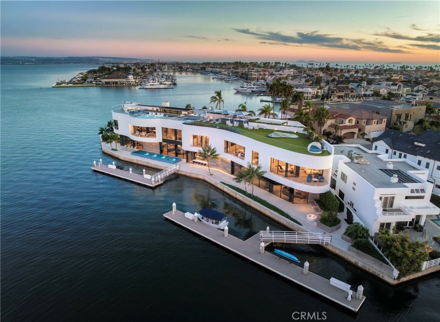 AUCTION BIDDING OPEN! Bidding ends September 17th. Previously Listed $37,500,000. Current High Bid $19,000,000. Private Showings by Appointment.
3 The Point creates an extraordinary sanctuary where contemporary sophistication meets the timeless allure of waterfront living on San Diego Bay. This architectural masterpiece transforms daily life into a celebration of coastal luxury, where floor-to-ceiling windows dissolve boundaries between interior elegance and the ever-changing canvas of bay and sky. The crown jewel rooftop deck becomes a private resort suspended above the water, offering endless entertaining possibilities amid panoramic vistas. Deep-water docks welcome yachting adventures while smart home automation orchestrates every comfort with effortless precision—waterfront living elevated to art form.
