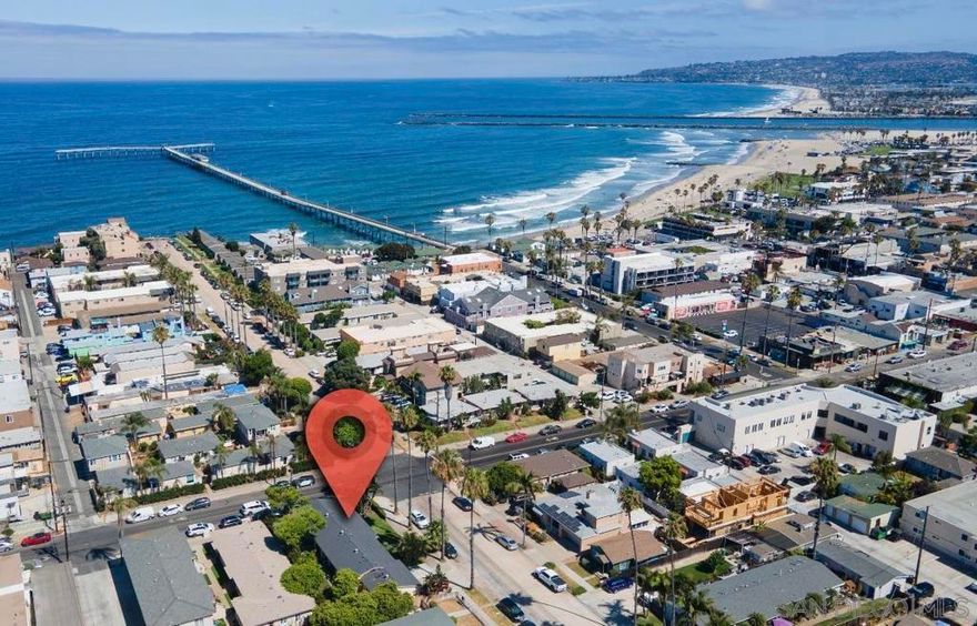 Smell the Salt! South Ocean Beach Triplex only a super short block to beaches & pier, half a block to live music, award-winning (dog-friendly!) restaurants and shopping. 3 units consisting of (1) 2 bedroom-2 full bath, and (2) 1 bedroom, 1 bath spacious units, all with direct entry, private yards, upgraded windows, granite counters, independent electric meters, 2 separate One-car garages +3 On-Site spaces. Locomotion at its finest! ***Check out short term values. Nearby: Robb Sports Field, Dog Beach, Sunset Cliffs, Short drive to San Diego International Airport), Balboa Park, Mission Bay, Mission Beach, La Jolla Shores, Torrey Pines Hiking & Golf Courses.  *[Buyer to verify all].