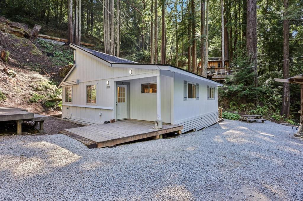 Just 10 minutes from the beloved Corralitos Market, this one-of-a-kind sanctuary offers the perfect blend of natural beauty and peaceful seclusion. Featuring 2 bedrooms, 1 beautifully remodeled bath, and a bonus loft. Completely upgraded from top to bottom, no detail was spared. Enjoy all-new appliances, stylish finishes, and an open, light-filled interior that flows effortlessly from room to room. This home is a true retreat above the fog line, where sunshine pours in through every window. Enjoy the creek while listening to nature sing in the background. This property is a true gem.