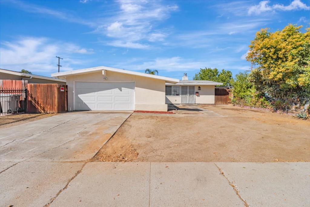 Welcome to your golden opportunity with great potential to make your own dream property or next project for another perfect beauty! A spacious lot awaits homeowners with vision or investors. This move-in ready home has comfortable living space for growing families, granite countertop kitchen offers practical space for your culinary needs, cozy dining area with door to access backyard, fireplace in bright living area, brand new water heater with warranty, 2 car attached garage, plenty of parking available on property. Large master bedroom with walk-in closet and double pane windows throughout the house. Easy access to highways, commute routes and close to shopping, dining, public transportation. Don't miss this dream chance to invest or make your own!