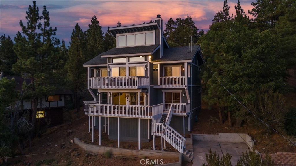 Welcome to 43866 Mendocino Drive: A stunning mountain retreat in the heart of Big Bear, offering luxury living with breathtaking views of Bear Mountain Resorts and the sparkling lake. This meticulously maintained home provides real hardwood floors throughout, providing a warm, timeless elegance that flows seamlessly from room to room, with solid core doors for enhanced privacy and sound insulation. Not to forget the flat top iron door that stands out from any other home.
Step into the sweeping gourmet kitchen, where all matching KitchenAid appliances—including a powerful range hood to keep your space smoke-free. Shine alongside sleek, standout cabinets and a stylish tile backsplash. Great for entertaining or everyday meals. This modern culinary home combines functionality with eye-catching design.
The bedrooms are true sanctuaries, featuring accent walls and unique murals painted with mountains and a serene moon, creating an atmosphere that sets each space apart. Downstairs, an entire open floor awaits your vision: currently a versatile game room that could easily be transformed into a home theater, family lounge, or bonus living area—great for movie nights, gatherings, or quiet relaxation.
Outside, enjoy unparalleled views from your own Juliet balcony, designed for ultimate seclusion while you soak in stunning sunsets over the mountains and lake. The freshly paved asphalt driveway adds curb appeal and convenience, while practical upgrades like a 220V electrical panel ready for your dream jacuzzi and a brand-new A/C unit ensure year-round comfort in this modern oasis.
Don't miss this rare opportunity to own a Big Bear Lake gem with resort-style views, high-end amenities, and endless potential. Schedule your viewing today and make this your ultimate escape!