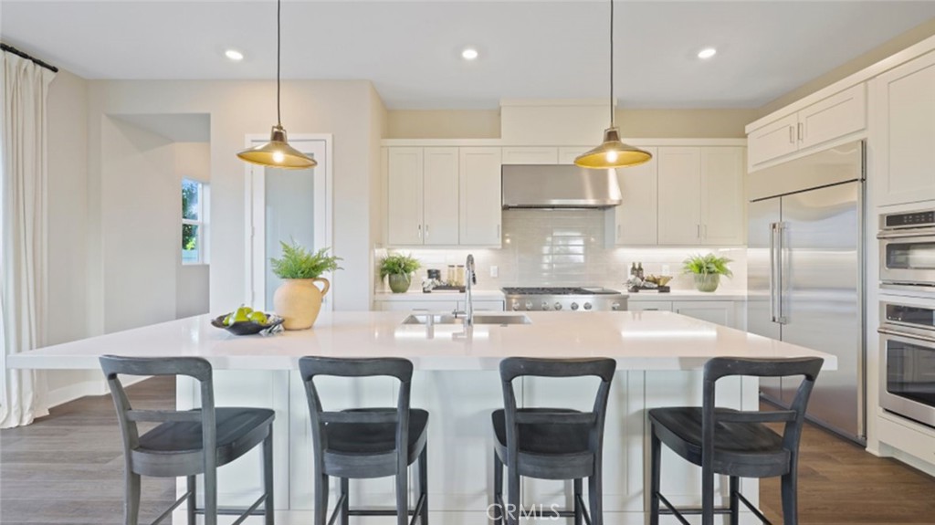 This new two-story home features a modern layout perfect for entertaining, with an inviting open-concept floorplan on the first floor. Upstairs, three bedrooms surround a versatile loft, including the luxurious owner’s suite complete with an en-suite bathroom, walk-in closet and access to a private deck. Estela at Luna Park is a new collection of single-family homes in Great Park Neighborhoods, a master-planned community in Irvine, CA. This collection enjoys masterplan amenities, including pools, parks, sport courts, and more. Residents will also enjoy award-winning schools in the Saddleback Valley School District and access to I-5 and I-405 offering convenient commutes. The Irvine Spectrum Center and other nearby shopping centers feature upscale retail and dining options.